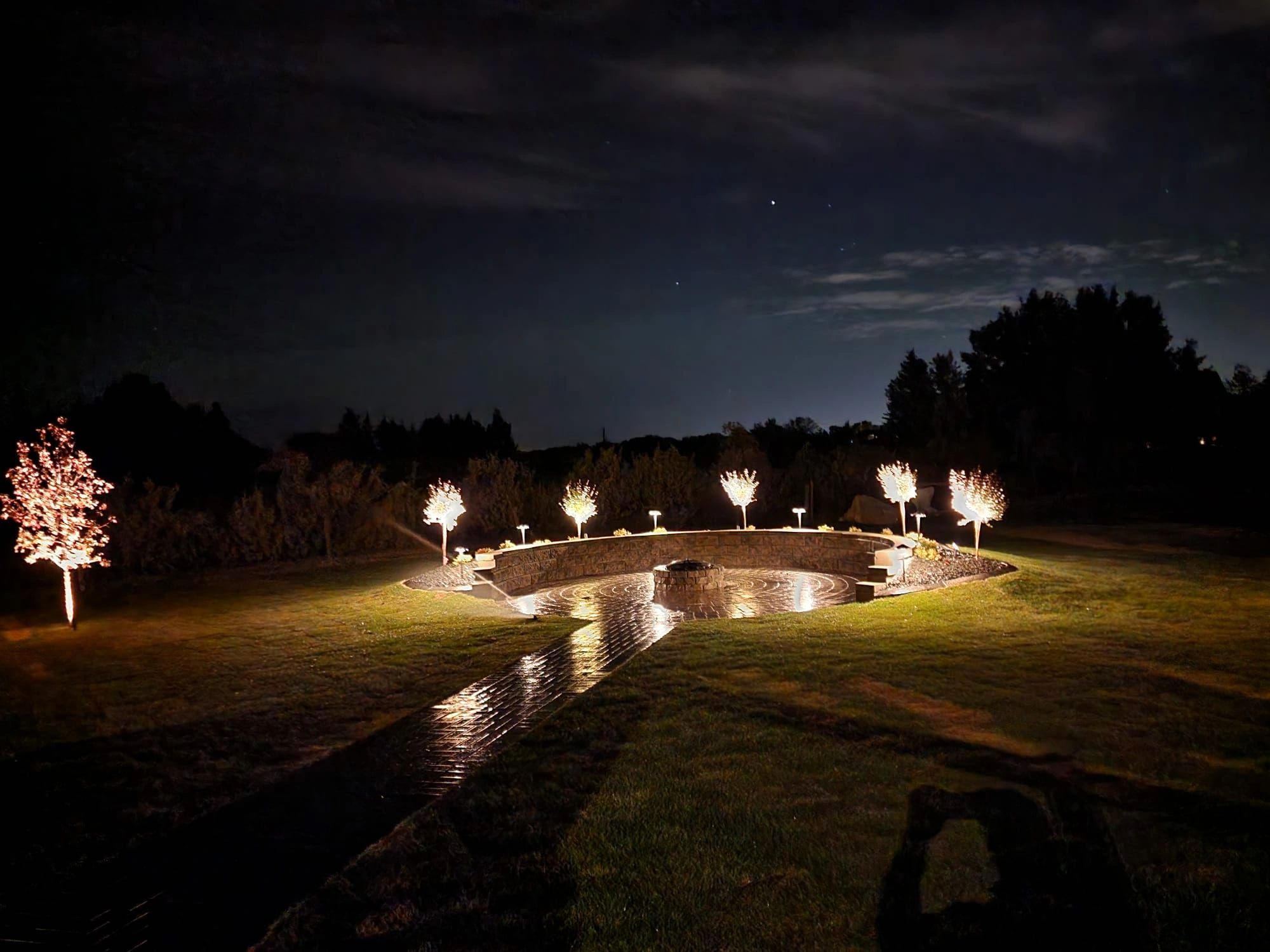 Illuminated outdoor amphitheater at night